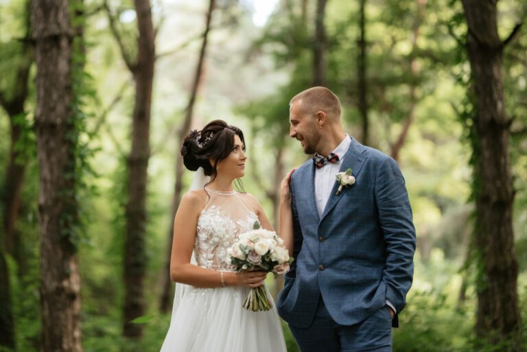 wedding-walk-of-the-bride-and-groom-in-the-deciduous-forest-in-summer